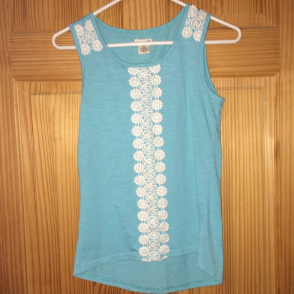 One Step Up Sleeveless Top